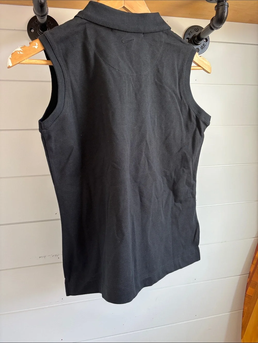 Nike women’s Golf pique Black Sleeveless Polo Tank